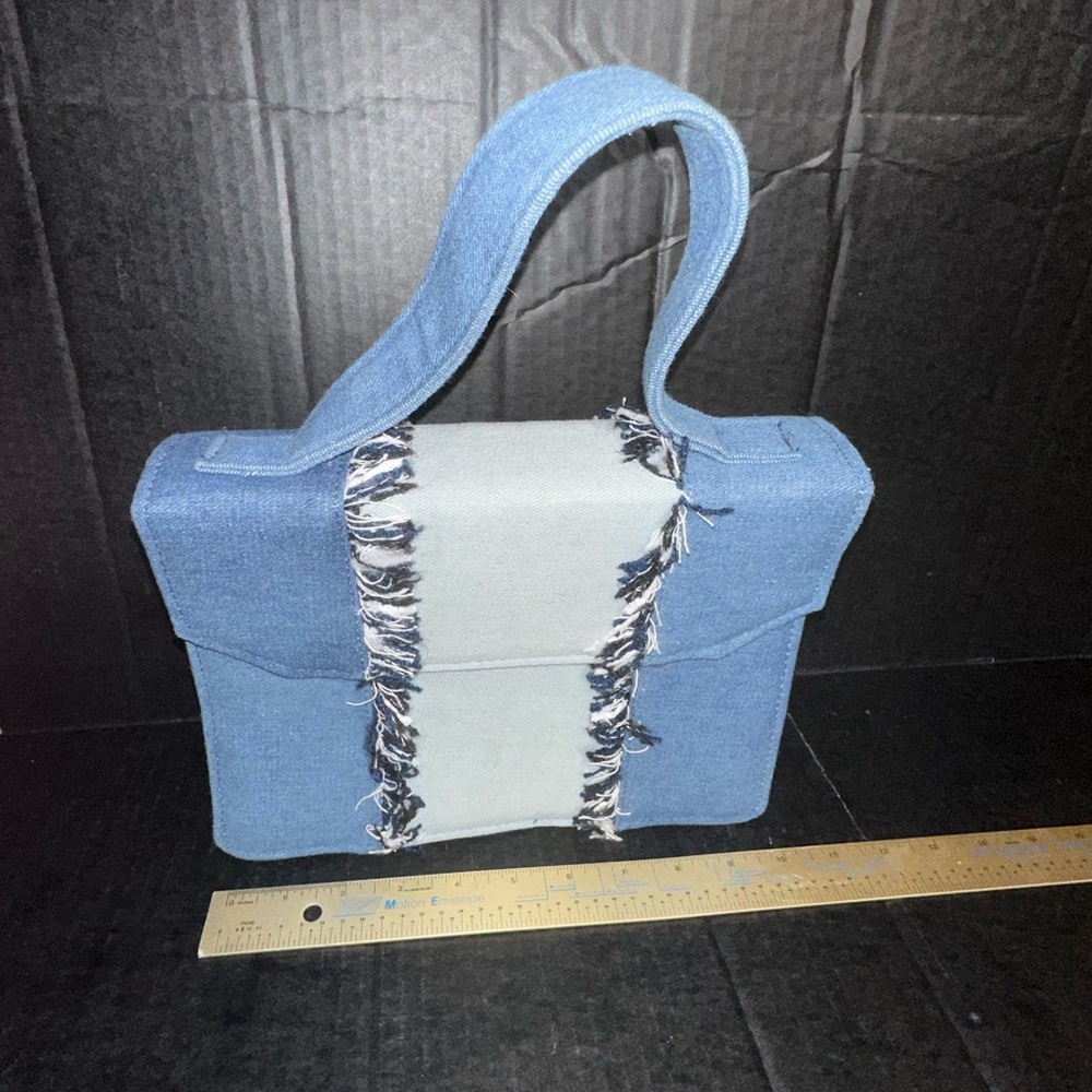 Small blue denim design handbag with chain estate item cute